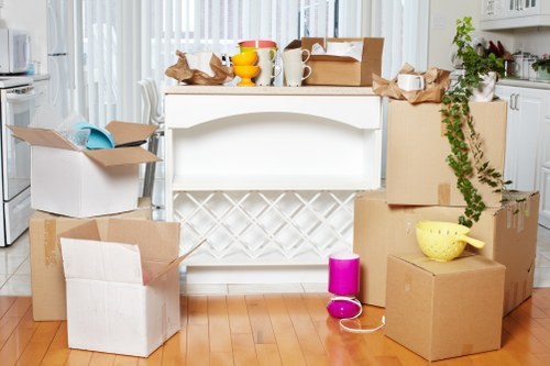 Packed boxes and furniture prepared for a home removal in Boundsgreen