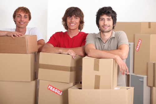 Local team loading unwanted furniture for pick-up