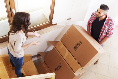 Packed boxes and furniture loaded into a moving truck