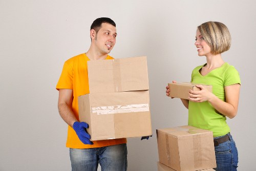 Packed office items and labelled boxes prepared for commercial move